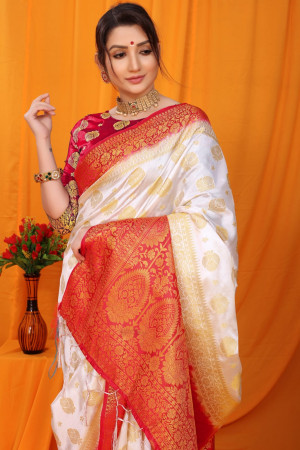 Off white color balatan silk saree with golden zari weaving work