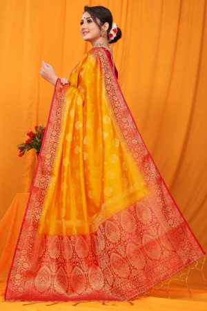 Yellow color balatan silk saree with golden zari weaving work