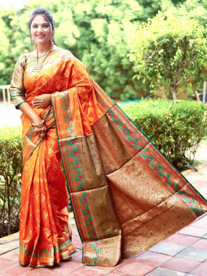 Orange color soft banarsi silk saree with zari weaving work