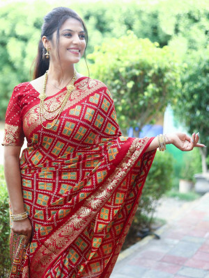Red color patola silk saree zari withweaving work