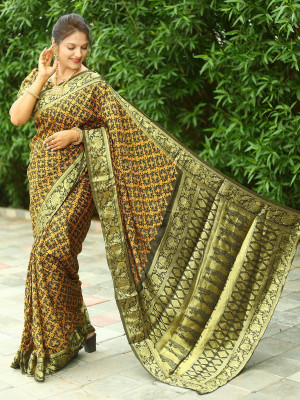 Mehndi green color patola silk saree with zari weaving work