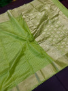 Parrot green color linen silk saree with zari weaving work
