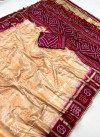 Peach and maroon color soft viscose silk saree with bandhani woven pallu
