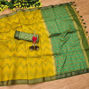 Yellow and green color tussar silk saree with zari woven work