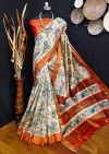 Orange color tussar silk saree with kalamkari printed design