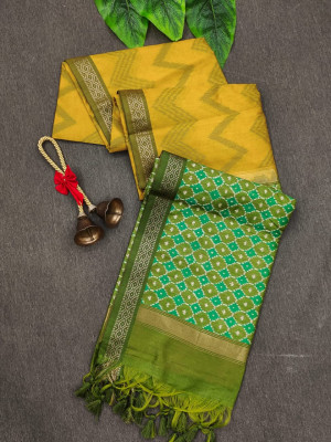 Yellow and green color tussar silk saree with zari woven work