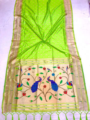 Pista  green color paithani silk saree with zari weaving work