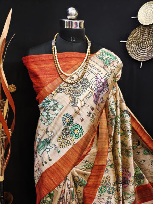 Orange color tussar silk saree with kalamkari printed design