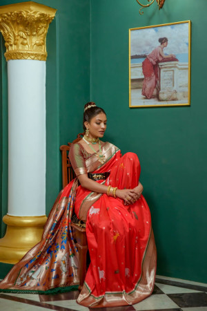 Red color paithani silk saree with zari weaving work