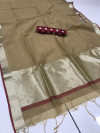 Cream color linen silk saree with checks and zari woven pallu