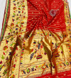 Red color paithani silk saree with golden zari  weaving work