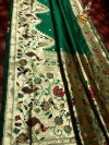 Green color paithani silk saree with pure golden zari weaving work