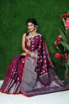 Magenta color lichi silk saree with silver zari weaving work