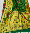 Green color paithani silk saree with golden zari  weaving work