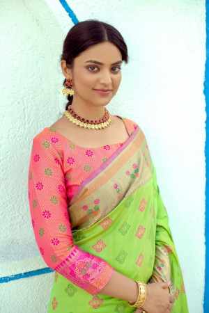 Parrot green color soft banarasi silk saree with meenakari design