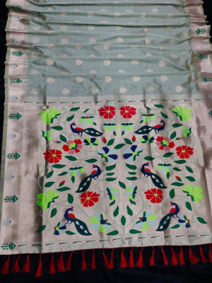 Light green color paithani silk saree with golden zari work