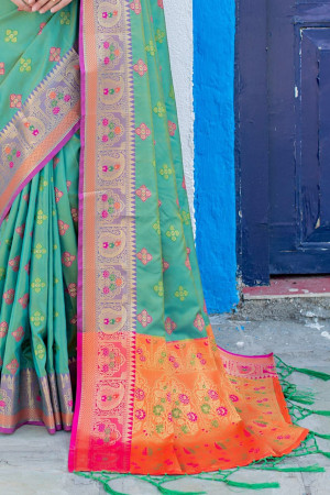 Green color soft banarasi silk saree with meenakari design