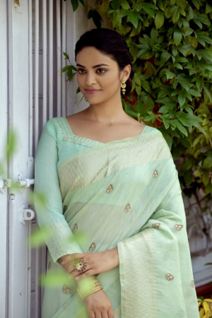 Green color kamchipuram tissue silk saree with zari woven work
