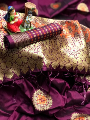 Magenta color lichi silk saree with zari weaving work
