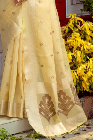 Yellow color kamchipuram tissue silk saree with zari woven work