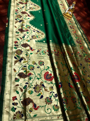 Green color paithani silk saree with pure golden zari weaving work