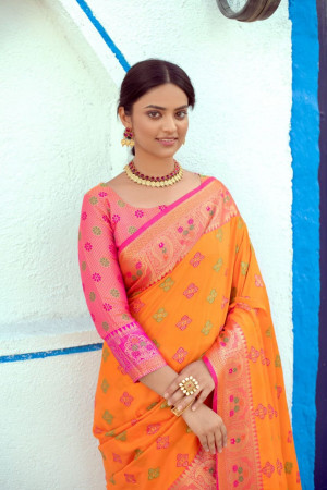 Orange color soft banarasi silk saree with meenakari design
