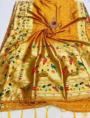 Orange color paithani silk saree with golden zari  weaving work