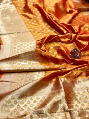 Orange color banarasi silk saree with golden zari weaving work