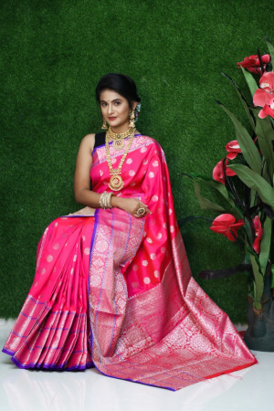 Pink color lichi silk saree with silver zari weaving work