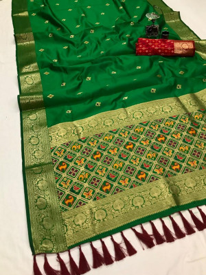 Green color kanchipuram silk saree with weaving work