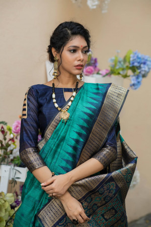 Rama green color tussar silk saree with weaving work