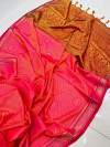 Peach color soft muslin silk saree with woven design