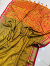 Mahendi green color soft muslin silk saree with woven design