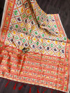 Off white color patola silk saree with woven design