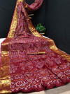 Maroon color soft bandhani saree with khadi printed work
