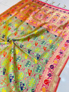 Pista green color patola silk saree with zari woven work