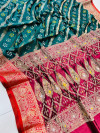 Dark green color bandhani silk saree with zari weaving work