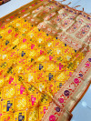 Yellow color patola silk saree with gold zari weaving work