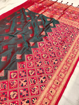 Rama green color banarasi silk saree with golden zari weaving work