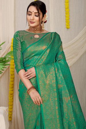 Green color soft fancy silk saree with golden zari weaving work