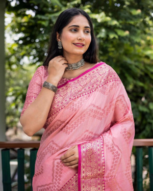 Baby pink color linen silk saree with golden  zari weaving work