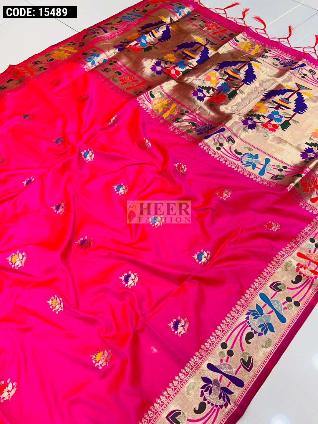 Rani pink color paithani silk saree with golden zari weaving work
