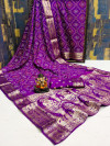 Purple color hand bandhej silk saree with printed work