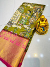 Mahendi green color kanchipuram silk saree with kalamkari design