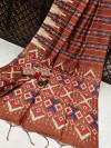 Brown color tussar silk saree with digital Ikkat printed work