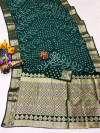 Bottle green color hand bandhej silk saree with zari weaving work