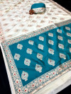 Off white and rama green color banarasi silk saree with zari weaving work