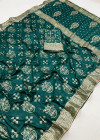 Bottle green color soft dola silk saree with zari weaving work