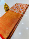 Orange color kanchipuram silk saree with woven design