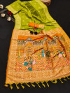 Parrot green color soft raw silk saree with woven design